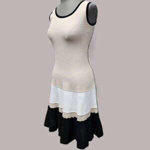 D. Exterior Sleeveless Knit Dress